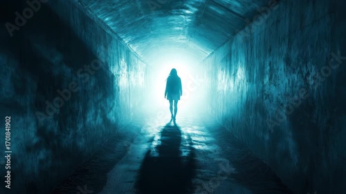 Mysterious figure emerges from dark tunnel into bright light at night, Person in tunnel end escapes darkness Mysterious horror scene