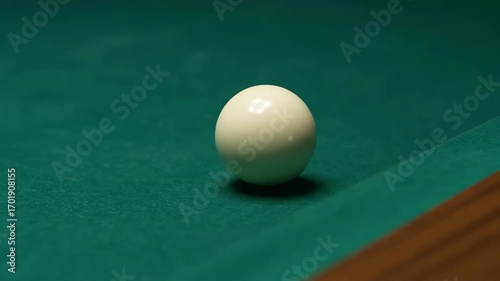 Wallpaper Mural Cue Ball Rolls on a Green Felt Billiard Table During a Game of Pool in a Brightly Lit Room Torontodigital.ca