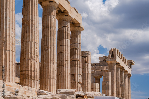 Ancient stone columns of Acropolis against the blue sky