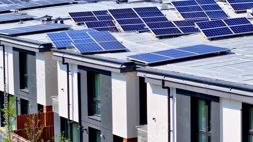 Residential solar panels on rooftops in a neighborhood
