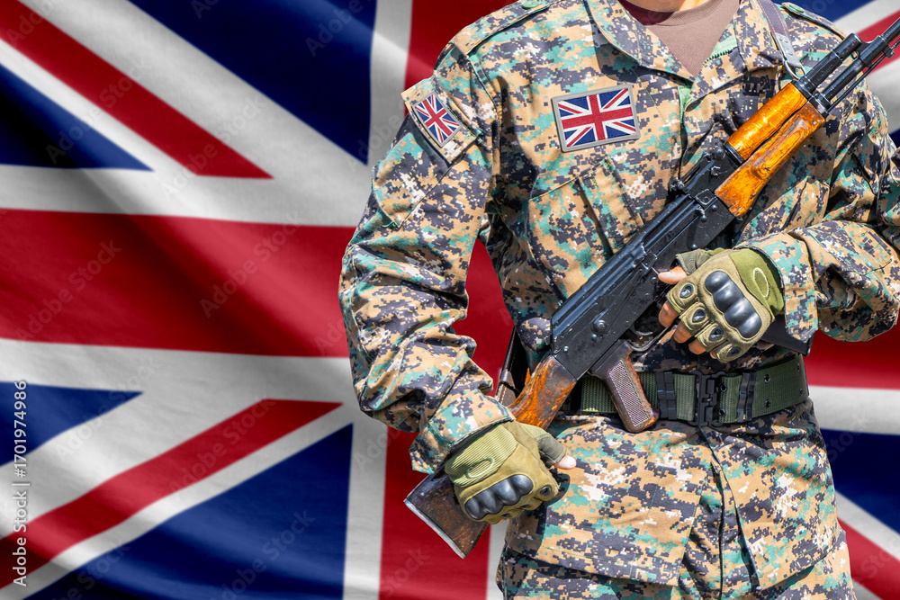 Fototapeta premium Great Britain flag with soldier holding assault rifle
