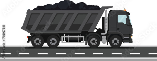 Heavyduty dump truck loaded with black coal on a road.