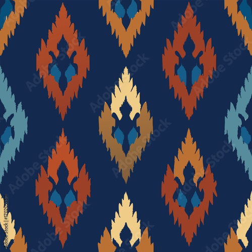 seamless ikat pattern, tribal textile style, handwoven look in indigo and earthy tones 1