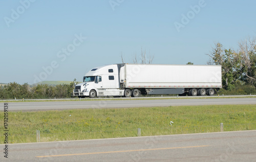 Heavy Cargo on the Road. A truck hauling freight along a highway