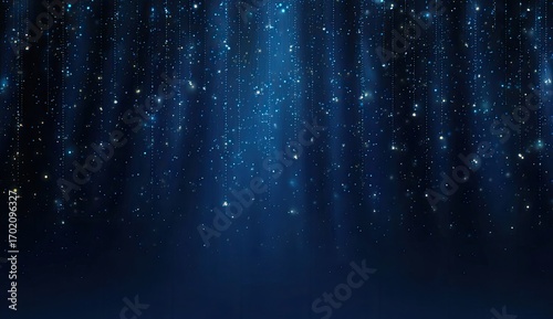 Dark backdrop with glittering, descending particles