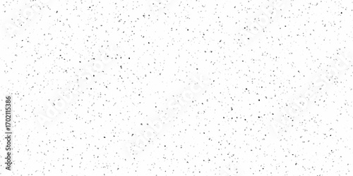 Abstract black speckled white background. White Textured Background with Small Black Dots. pattern of scattered small dark squares on a white background drops of water on a glass.