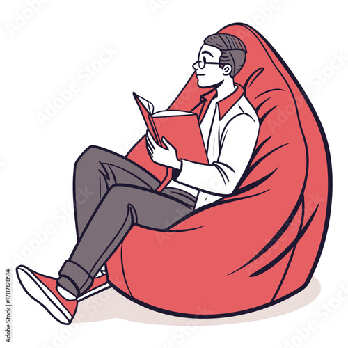 Man relaxing and reading a book on a comfortable beanbag chair