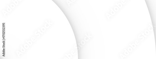 Abstract white curved background with soft shadows creating a minimalist and clean aesthetic.