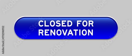 Blue color capsule shape button with word closed for renovation on gray background