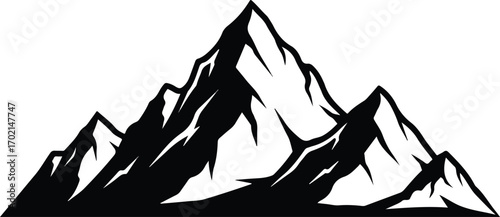 Black silhouette of jagged mountain peaks landscape
