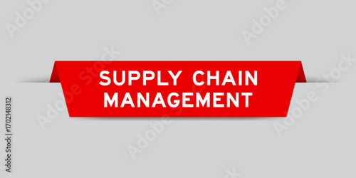 Red color inserted label with word supply chain management on gray background