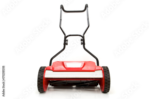 Front view of a used cylinder lawn mower isolated on white
