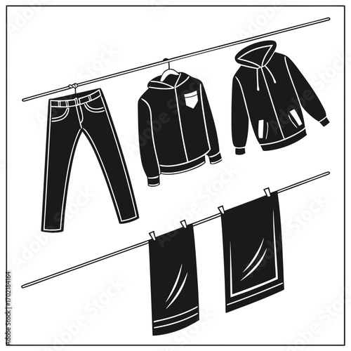 Black and white illustration of laundry hanging on a clothesline including jeans two hooded jackets and two towels secured with clothespins for drying outdoors