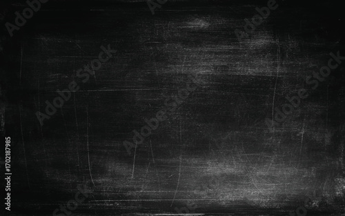 Chalk rubbed out on blackboard background. 