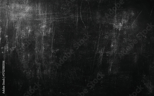 Chalk rubbed out on blackboard background. 