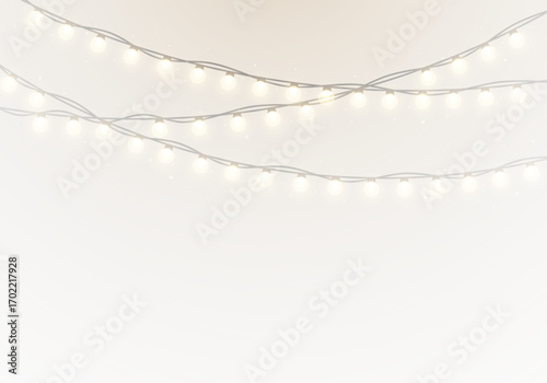 Glowing festoon lights and garlands shining in bright holiday decoration.