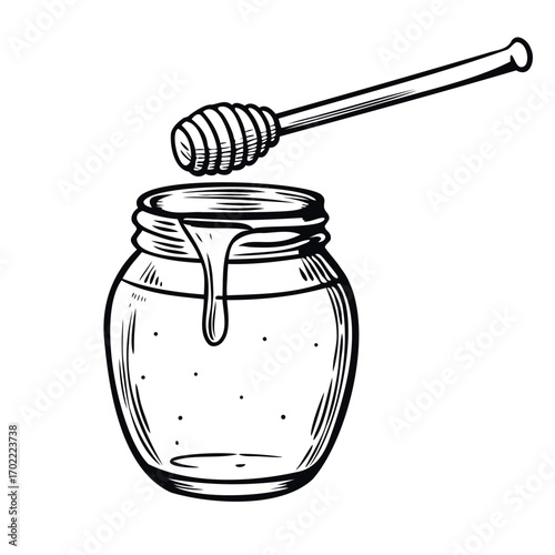 A glass jar filled with honey, with a wooden honey dipper resting on top. The honey is dripping from the dipper into the jar.