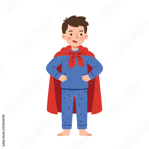  a boy wearing blue pajamas with a red blanket tied around his neck as a cape, standing with hands on his hips and chest puffed out, 