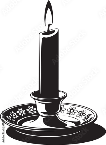 Black candle in an ornate candlestick with a flickering flame