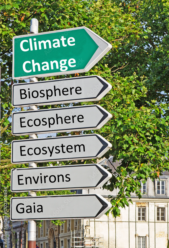 Naklejka premium A concept road sign pointing in the direction of 'Climate Change' with some descriptive words underneath