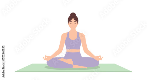 Woman meditating in lotus pose on a yoga mat, promoting wellness and relaxation practices