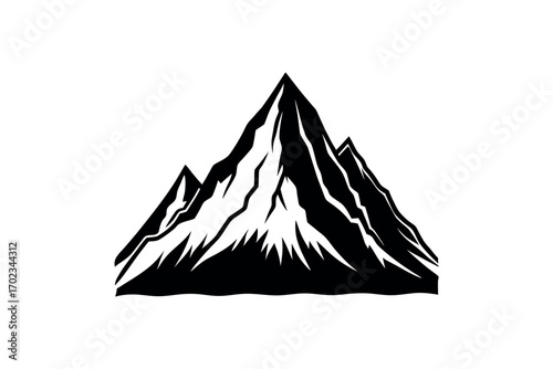 a majestic mountain peak with sharp edges and shadowy silhouette