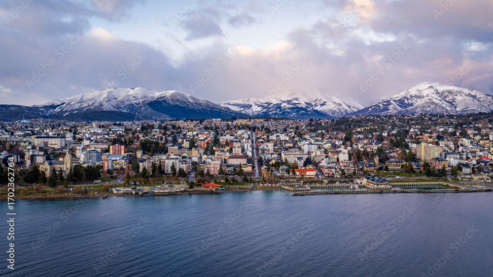 Fototapeta premium Panoramic aerial view of San Carlos de Bariloche with snowy Andes mountains in Patagonia.