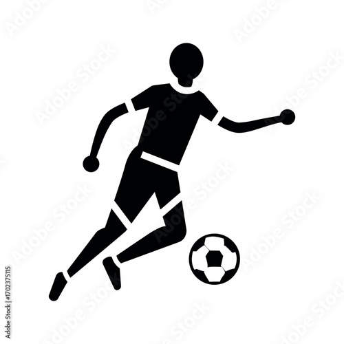 Black silhouette of soccer player kicking ball football