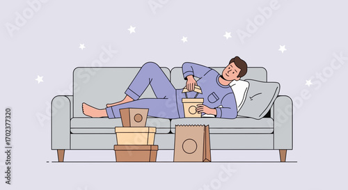 Evening Relaxation: A Man Unwinds At Home While Enjoying His Food Delivery