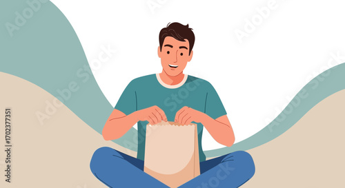 Excited Young Man Opening Bag, Sitting Cross-Legged Illustrating Enthusiasm And Expectation