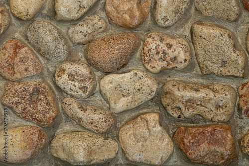 Abstract macro shots of tiny stones on wall