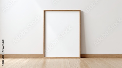 Modern Wooden Frame Mockup on Parquet Floor Against White Wall for Art Display