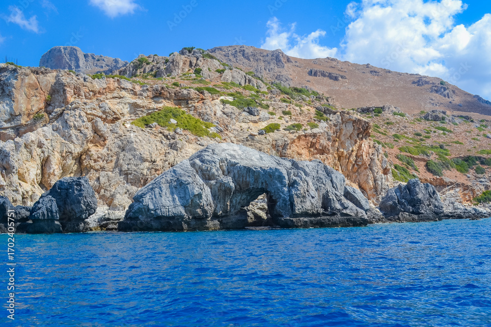 Fototapeta premium Rocky coastline and turquoise sea near Palm Beach Crete