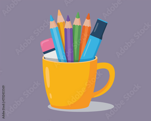 Creative workspace concept with a yellow mug holding colorful pencils and art supplies