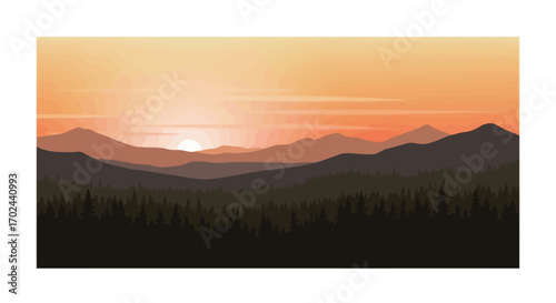 Sunset over a mountain range with a forest in the foreground.
