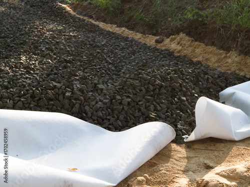 Gravel is Being Carefully Laid on a Site for a Construction Project