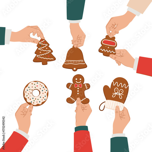Hands holding various Christmas gingerbread cookies in a circle.