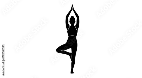 Silhouette of a woman performing the Tree Pose in yoga.