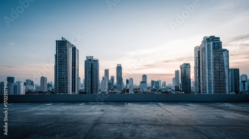 Cityscape Panorama from Rooftop at Sunset: Modern Urban Architecture and Skyline View