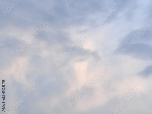 Canvas Print Soft Stratus And Stratocumulus Clouds in Pale Blue Sky