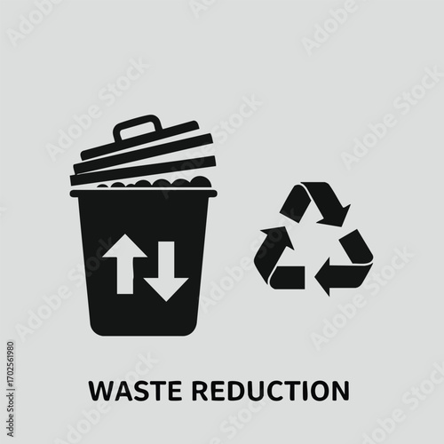 Black waste bin with arrows and recycling symbol representing waste reduction and environmental sustainability concept