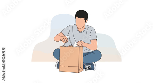 Person Carefully Examining Items In Brown Paper Bag While Sitting On The Floor