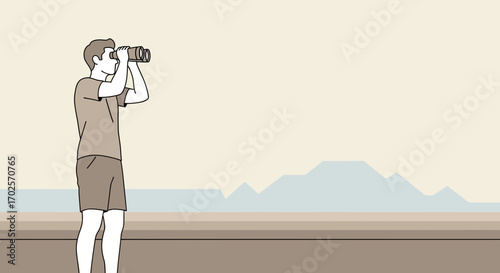 Man Observing The Landscape With Binoculars During A Bright Sunny Day Outdoor Adventure
