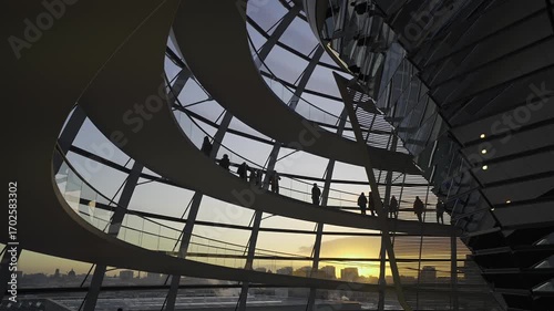Berlin, Germany. Reichstag glass dome interior at dawn. Spiral walkway inside glass dome of Bundestag in Berlin at sunset. Kuppel und Dachterrasse des Reichstagsgebaudes
