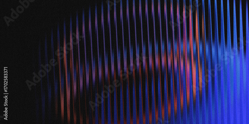 Abstract vertical lines in blue purple and orange against a dark background creating a pattern