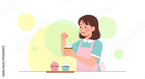 Woman Decorating Cupcake Fresh From The Oven Showing Joy And Happiness In Kitchen
