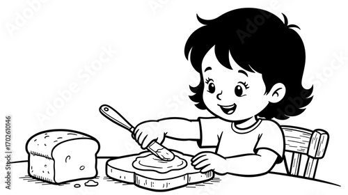 Young child spreading butter on bread with a smile at the table  