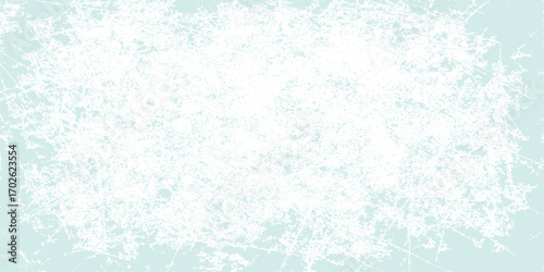 Abstract blue grunge background with a frozen winter snowflake pattern and texture
