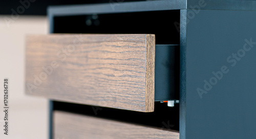 Opened drawer cabinet furniture wooden table at workplace