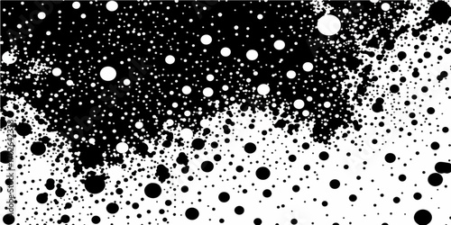 Black and white water drops on a glass with